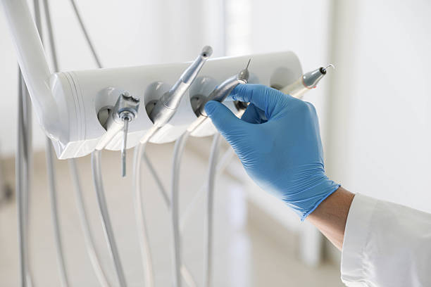 Professional Emergency Dentist technician working in Hales Corners, WI